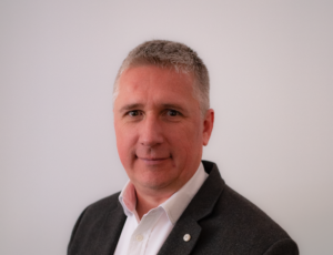 Colour photo head and shoulders of bank Chief Executive Adrian Sargent